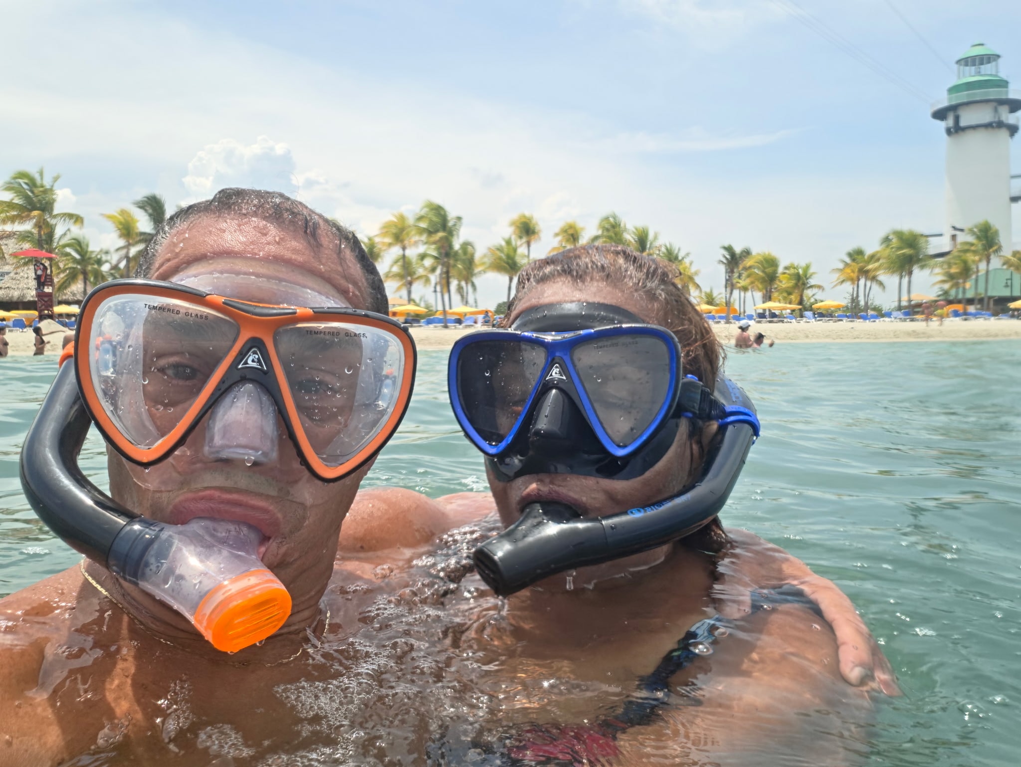 Snorkeling adventure with lighthouse in the background
