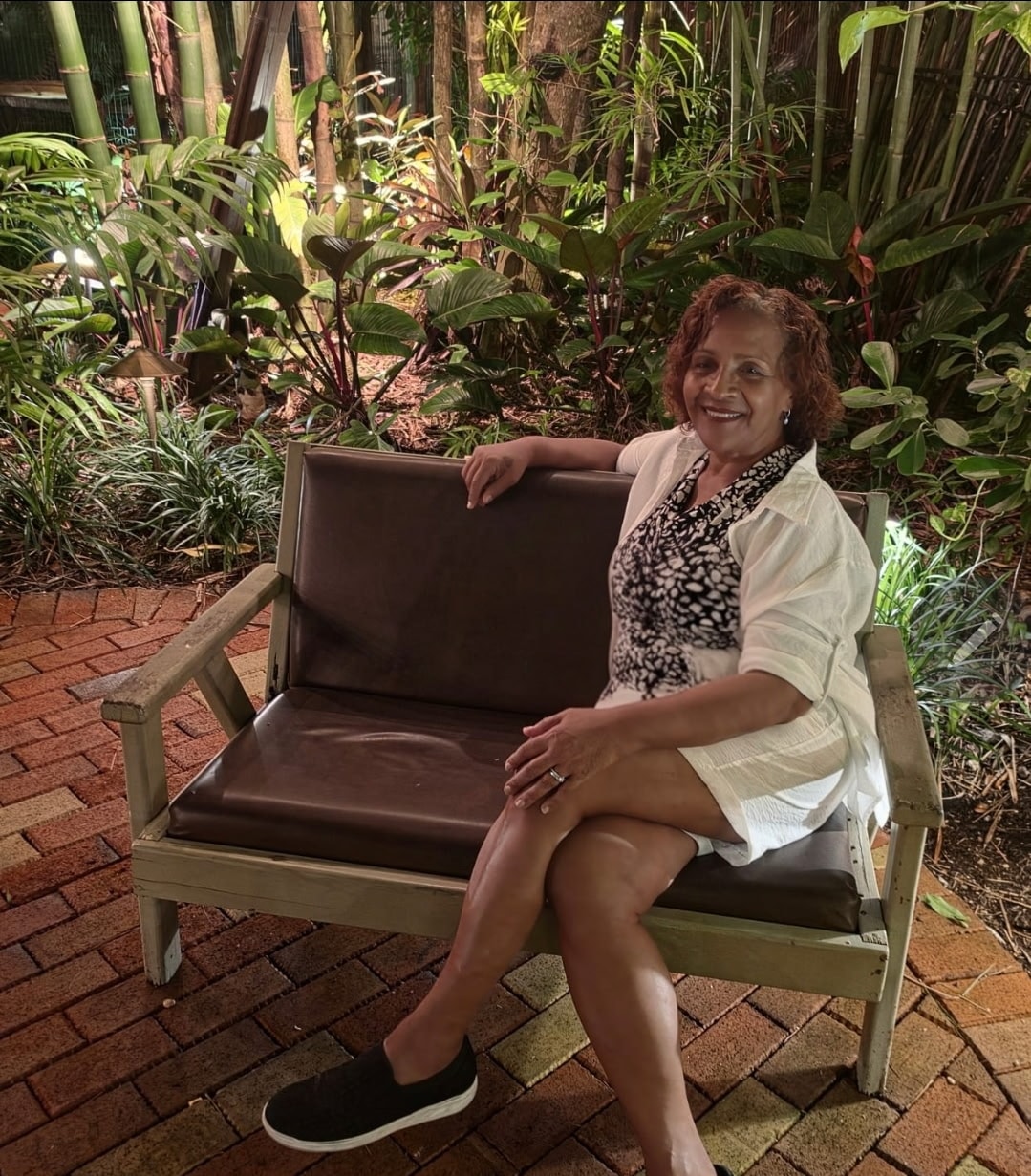 Jean at a tropical beach resort